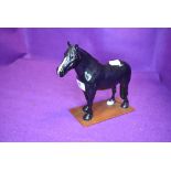 A Beswick study, Dales Pony, Maisie, model no 1671, on home made wooden plinth