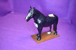 A Beswick study, Dales Pony, Maisie, model no 1671, on home made wooden plinth