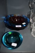 Two large and heavy pieces of colourful art glass.