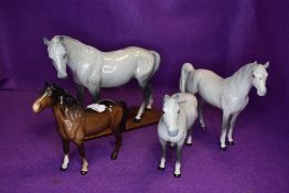 Four Beswick studies, Mare, facing left, grey, model no 976, Pony, head up, brown model no 1197,