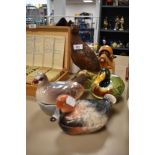 A selection of bird themed ceramics including Royal Doulton grouse decanter and a set of three ha