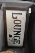 A vintage wooden cased glass light box giving directions for 'Lounge'.AF.
