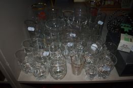 A selection of glass wares including pub tavern glasses