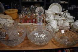 Three glass fruit bowls,a decanter and a vase.