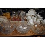 Three glass fruit bowls,a decanter and a vase.