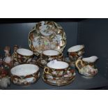 A collection of oriental cups and saucers,sugar basin and plates.AF