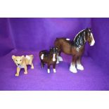 Three Beswick studies, Shire Mare, brown, model no 818, Shetland Pony, brown, model no 1033 and Lion