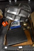 A box of mixed flatware a silver plated photo frame, canteens if cutlery and more.