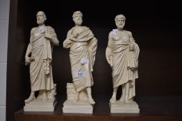 Three Greek figurines including Socrates.