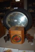 An oval ebony framed Victorian mirror and tea caddy