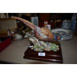 A ceramic figure of a pheasant by Coalport limited run no. 124 of 750