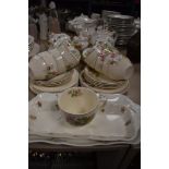 A selection of tea cups and saucers including Ringtons