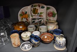 An assortment of studio pottery and similar including bowls,jugs and platter.