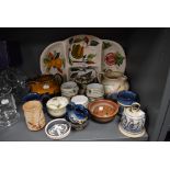 An assortment of studio pottery and similar including bowls,jugs and platter.