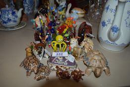 A selection of figurines and small glass miniatures including sea life and fish interest