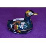 A cloisonné lidded trinket pot in the form of a duck.