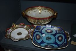 Three highly decorative pieces of Noritake, each having delicate floral patterns and extensive