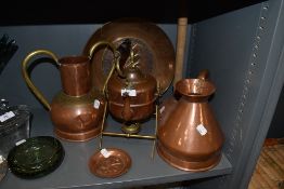 A collection of copper including kettle with stand, platter,jug and urn.