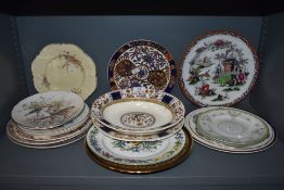 A selection of plates and bowls, various eras and styles.