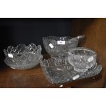 A selection of vintage glass including large bowl and salad servers.