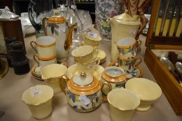 A part coffee service by Crown Devon in an Art Deco design and similar tea set