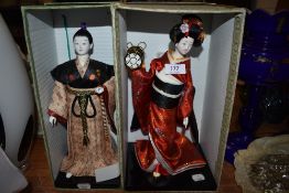 Two mid century Japanese Hakata figures or dolls having original case and porcelain bodys