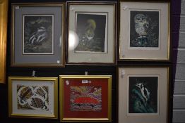 A selection of prints and picture frames including Aboriginal art