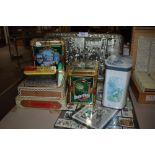 A selection of advertising tins and a set of stamps with Kew garden interest
