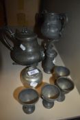 A selection of pewter wares including desk top ink well and urn