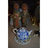 A small Chinese export tea pot circa 1850 having blue and white design with tea strain inner and