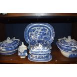 A mixed lot of blue and white ware including tureens and platters.