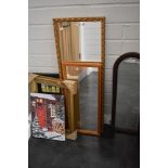 A selection of prints and picture frames including mirrors