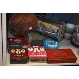 A selection of vintage transfer printed advertising tins including Craven A and OXO