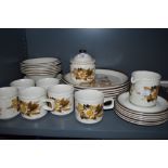 A collection of retro Doverstone pottery including plates, cups, saucers,bowls and more.