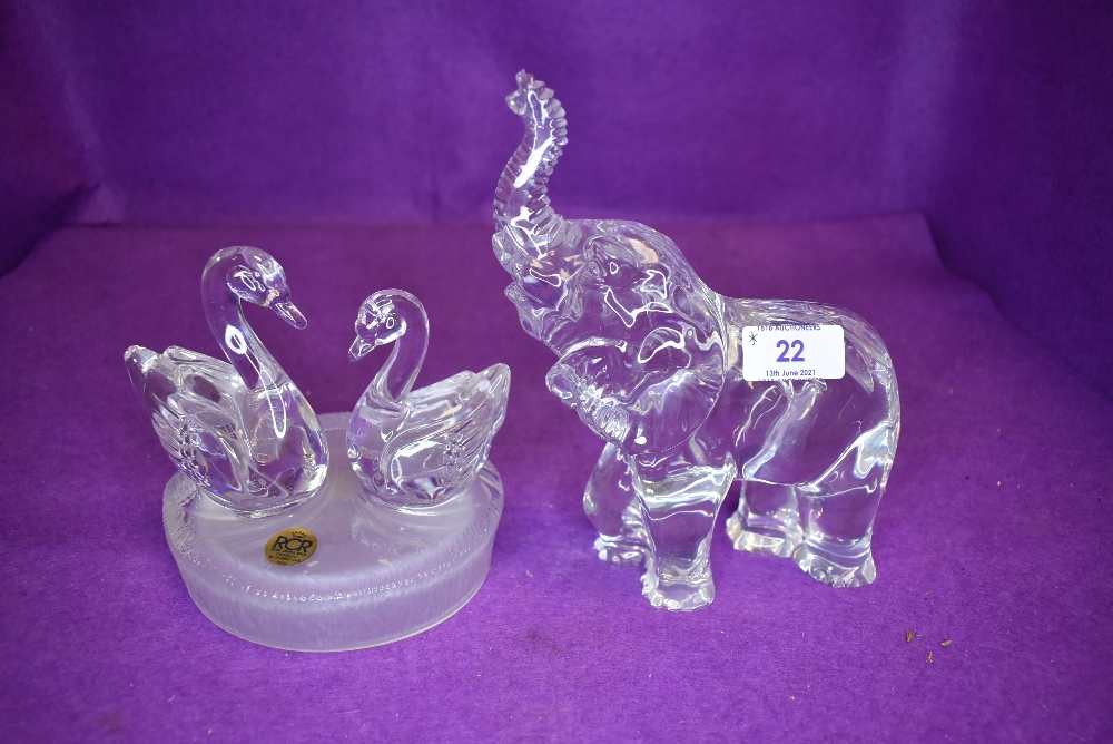 A Royal Crystal rock swan figurine and Waterford Crystal elephant