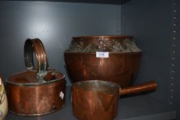 A trio of vintage copper collectables,pan,floral embossed planter and kettle.
