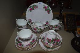 A part tea service by Colclough having a pink and floral design