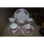 A part tea service by Colclough having a pink and floral design