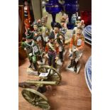 A selection of Napoleonic figures by Capodimonte and brass cannon