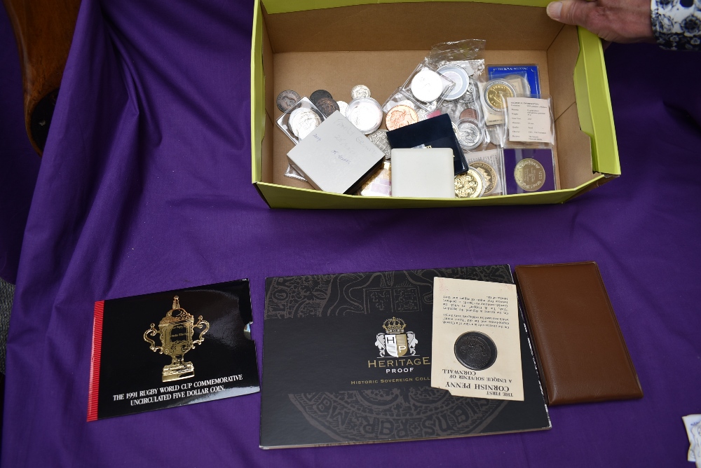 A box containing various Coins and Medallions including Singapore 1975 set, 1915 Half Crown, Italian