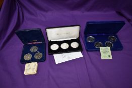 Three boxed sets, Three £5 Tristan Da Cunha Coins, silver plated copper, Three 1 Crown coin set