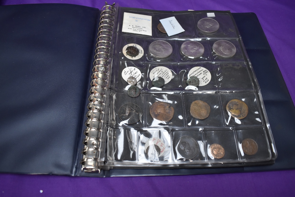 A Coin Album containing mainly GB and Roman Coins including 1853 Farthing, 1841 Halfpenny, 1841