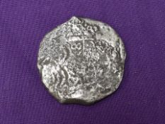 A Spanish 8 Reales Silver Coin, wreck damaged, said to be from the wreck of the Association,