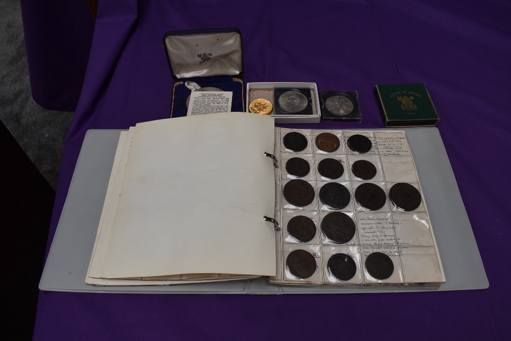 An album of GB Tokens mainly copper and bronze, approx 78 tokens, most in good condition, along with