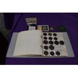 An album of GB Tokens mainly copper and bronze, approx 78 tokens, most in good condition, along with