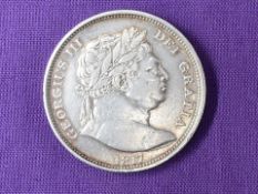 A George III 1817 Bull Head Halfcrown having milled edge