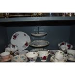 A mixed lot of general ceramics including cups and saucers and cake stand with three tiers.