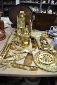A mixture of brass including button cleaner, ornaments and more.