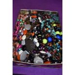A box of costume jewellery necklaces