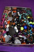 A box of costume jewellery necklaces